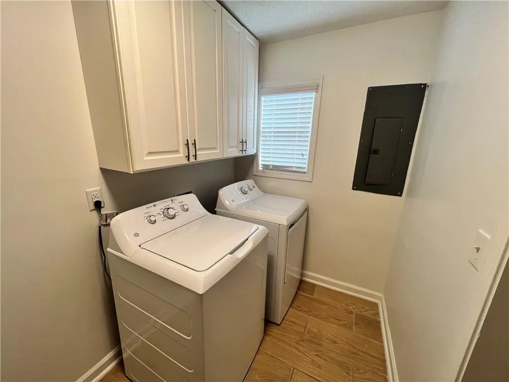 It all comes out in the wash :-), in this spacious laundry room.