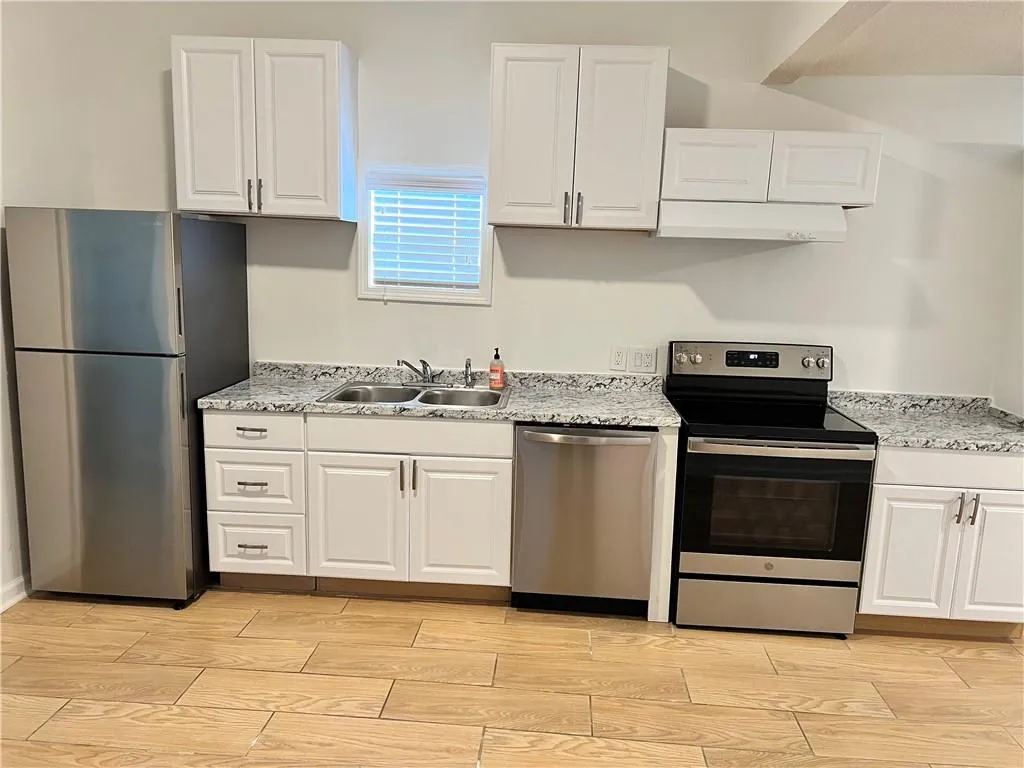 Shiny new stainless steel appliances.