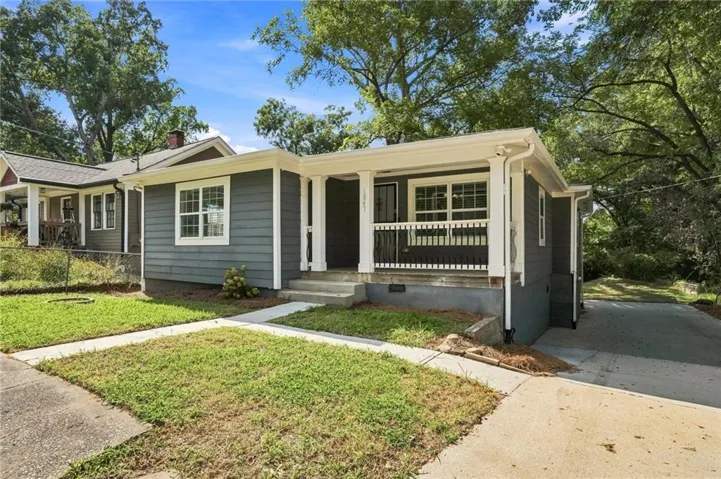 Gray horizontal siding exterior with white trim