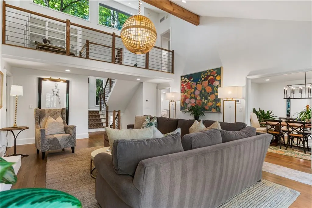 Grand light-filled 2 story vaulted Greatroom with Fireplace