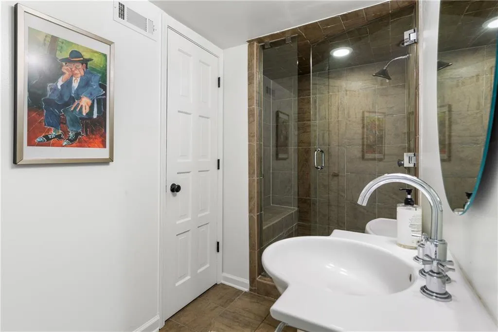 Ensuite Bath with Steam Shower, linen closet and tons of storage
