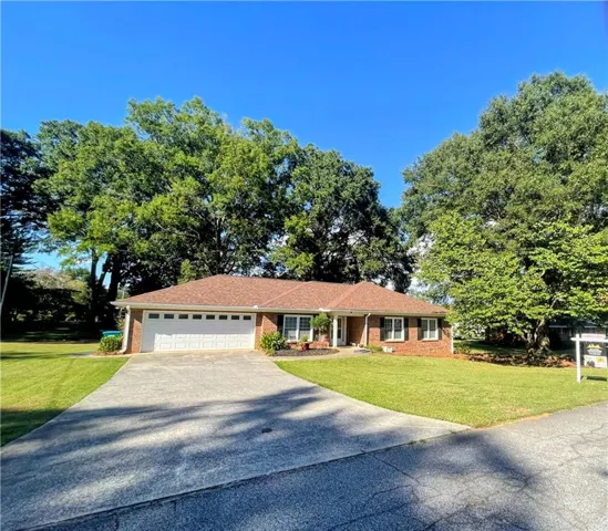 Stepless 4 sides brick ranch has seamless transitions throughout the 3 bedroom 2 bath home.