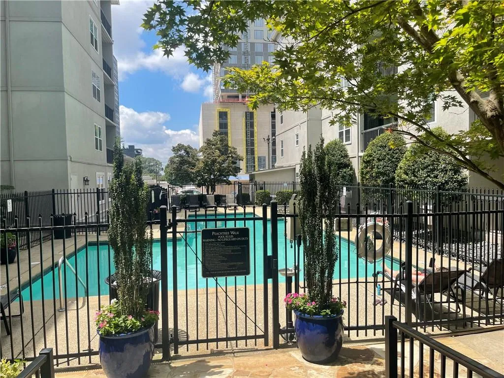 Community pool featuring a patio area