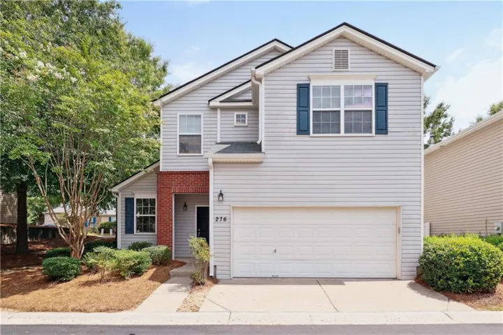 Front facade featuring a garage