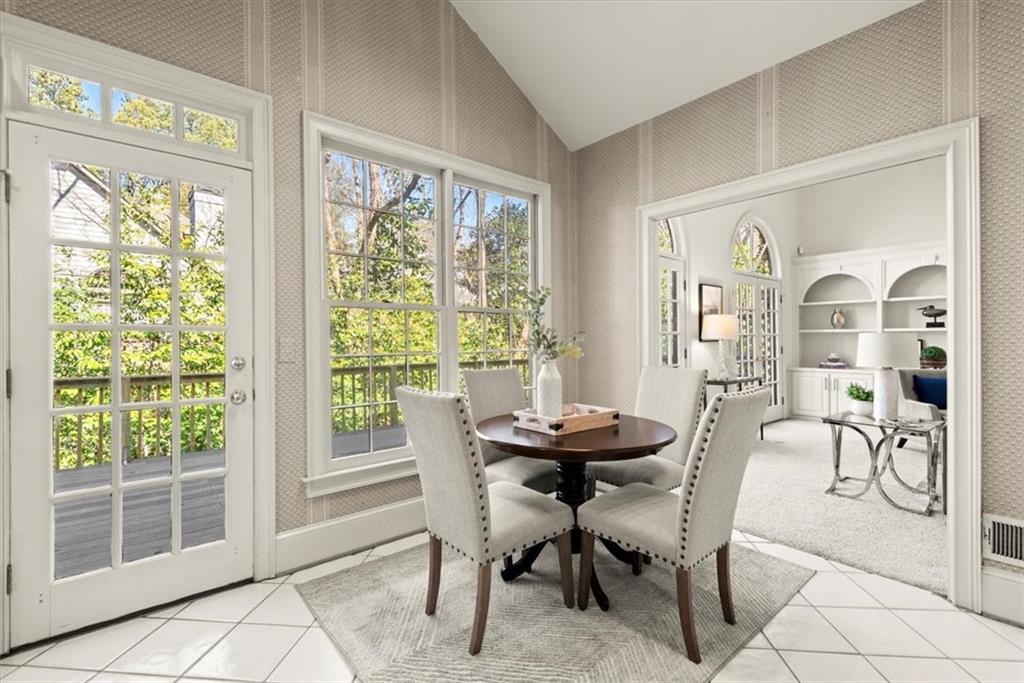 Experience the best of both worlds in this kitchen, featuring a cozy breakfast table area and a convenient walk-out door to the back porch. Enjoy the ease of dining in the kitchen while relishing in the option to step outside and savor a meal amidst the refreshing ambiance of the outdoors. Experience the best of both worlds in this kitchen, featuring a cozy breakfast table area and a convenient walk-out door to the back porch. Enjoy the ease of dining in the kitchen while relishing in the option to step outside and savor a meal amidst the refreshing ambiance of the outdoors.