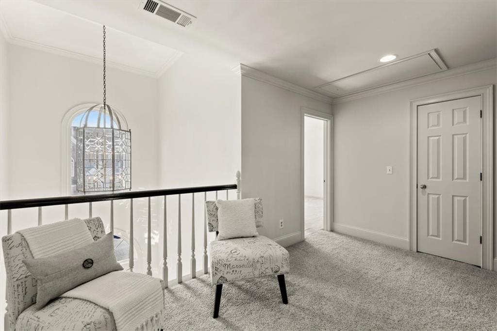 The upstairs landing opens to two secondary bedrooms on each side, providing flexibility and convenience. The upstairs landing opens to two secondary bedrooms on each side, providing flexibility and convenience.