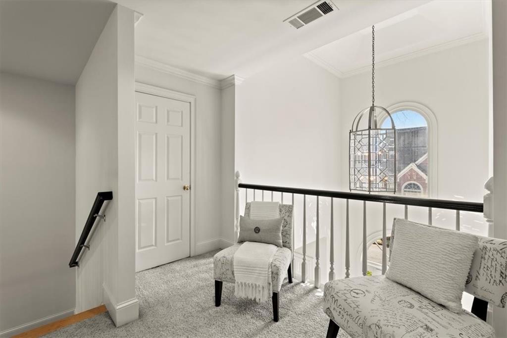 Discover the inviting upstairs landing, featuring a cozy sitting area that overlooks the two-story foyer. Whether you're enjoying a quiet moment with a book or simply taking in the breathtaking views, the combination of comfort and abundant natural light creates a truly peaceful atmosphere. Discover the inviting upstairs landing, featuring a cozy sitting area that overlooks the two-story foyer. Whether you're enjoying a quiet moment with a book or simply taking in the breathtaking views, the combination of comfort and abundant natural light creates a truly peaceful atmosphere.