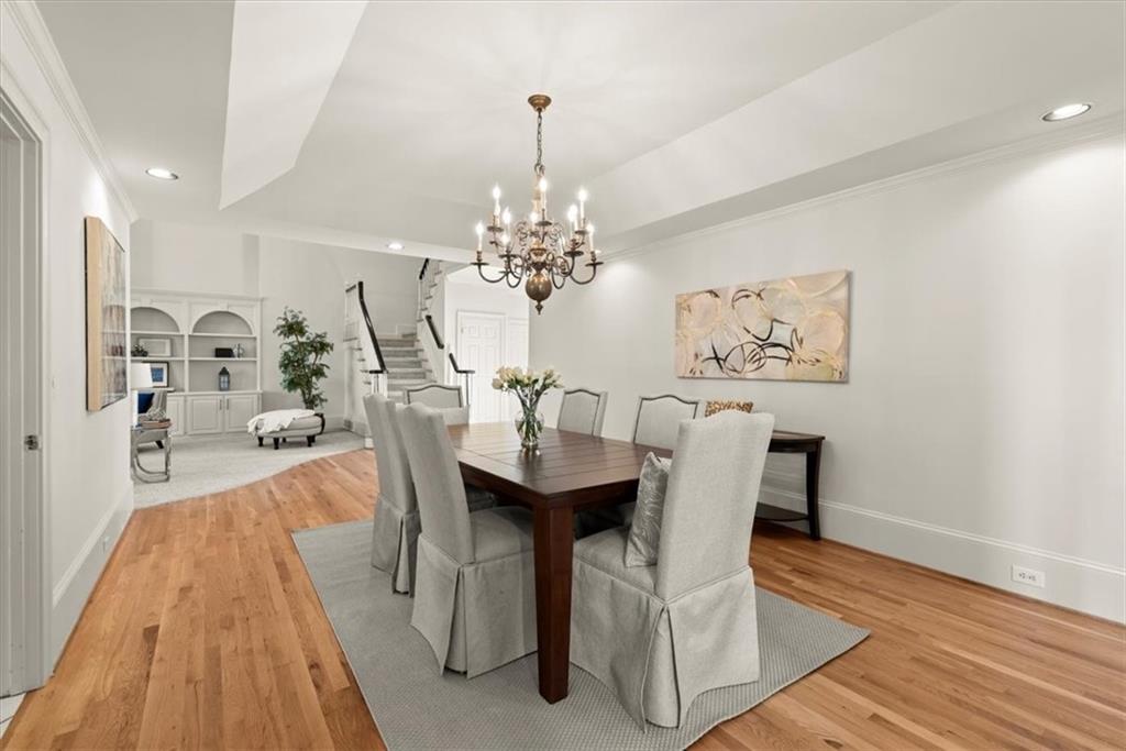 This open floor plan is the ideal layout allowing for effortless entertaining, as guests can easily transition from the dining room to the inviting living room as well as the kitchen. This open floor plan is the ideal layout allowing for effortless entertaining, as guests can easily transition from the dining room to the inviting living room as well as the kitchen.