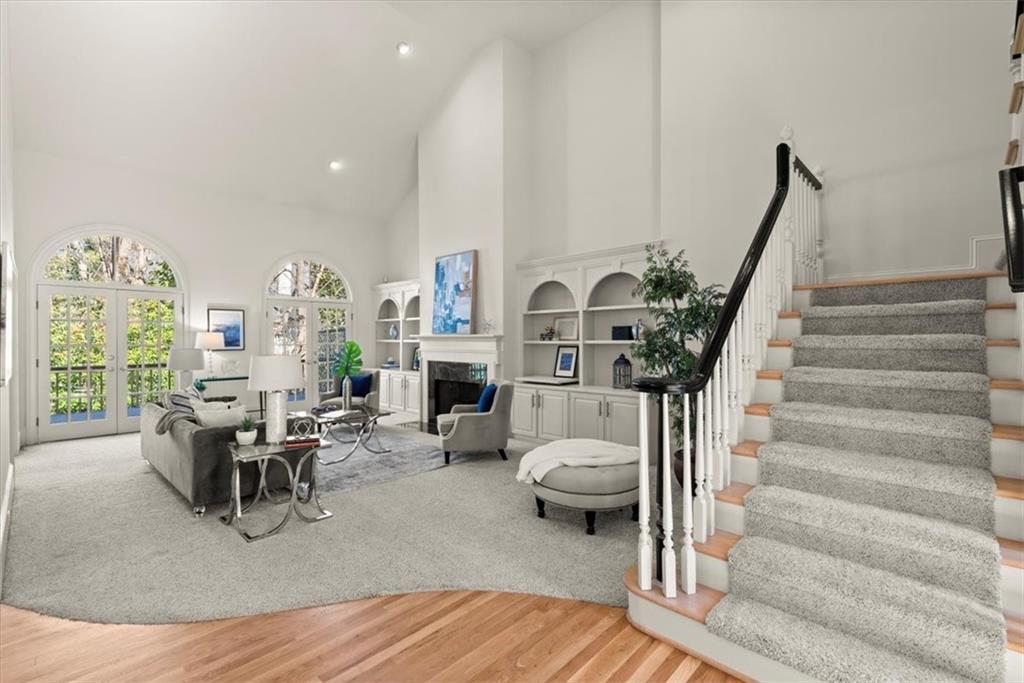 Embrace the spaciousness of this open floor plan, where the grandeur of a two-story living room meets the convenience of an open layout. Embrace the spaciousness of this open floor plan, where the grandeur of a two-story living room meets the convenience of an open layout.