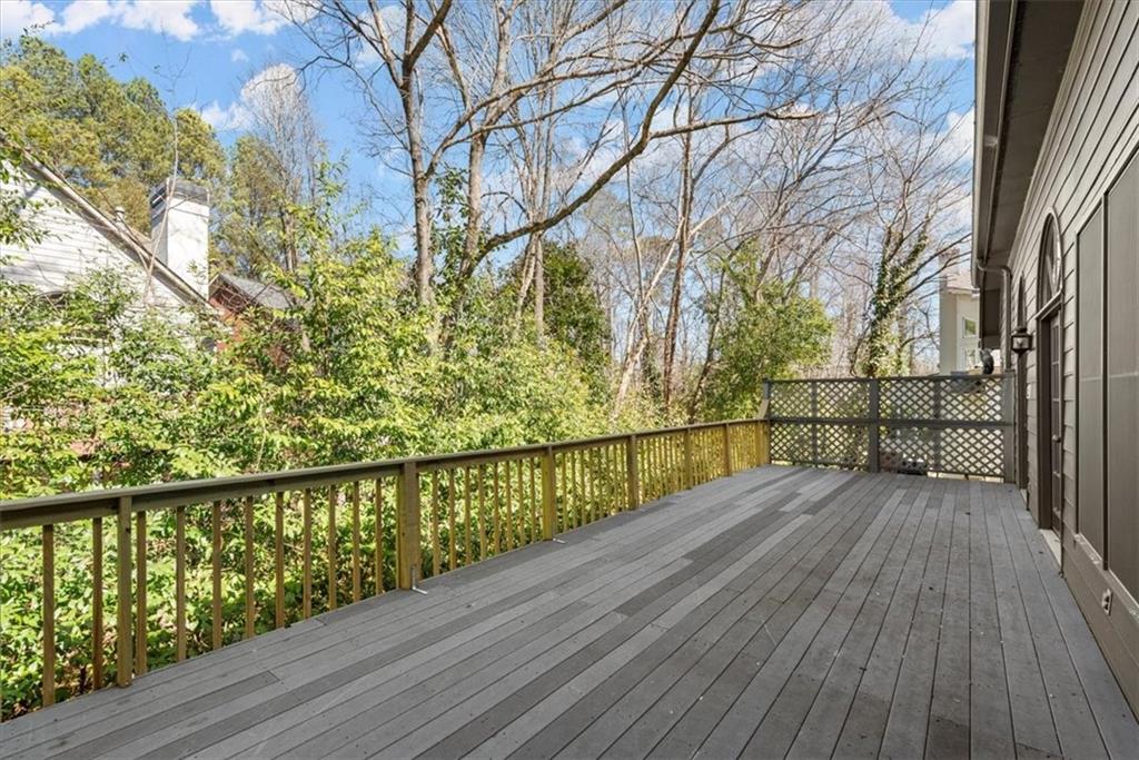 Step onto the spacious back deck, featuring low maintenance trek decking, and leave your worries behind. Designed for easy upkeep, this expansive outdoor space offers the perfect setting to relax and unwind. Step onto the spacious back deck, featuring low maintenance trek decking, and leave your worries behind. Designed for easy upkeep, this expansive outdoor space offers the perfect setting to relax and unwind.