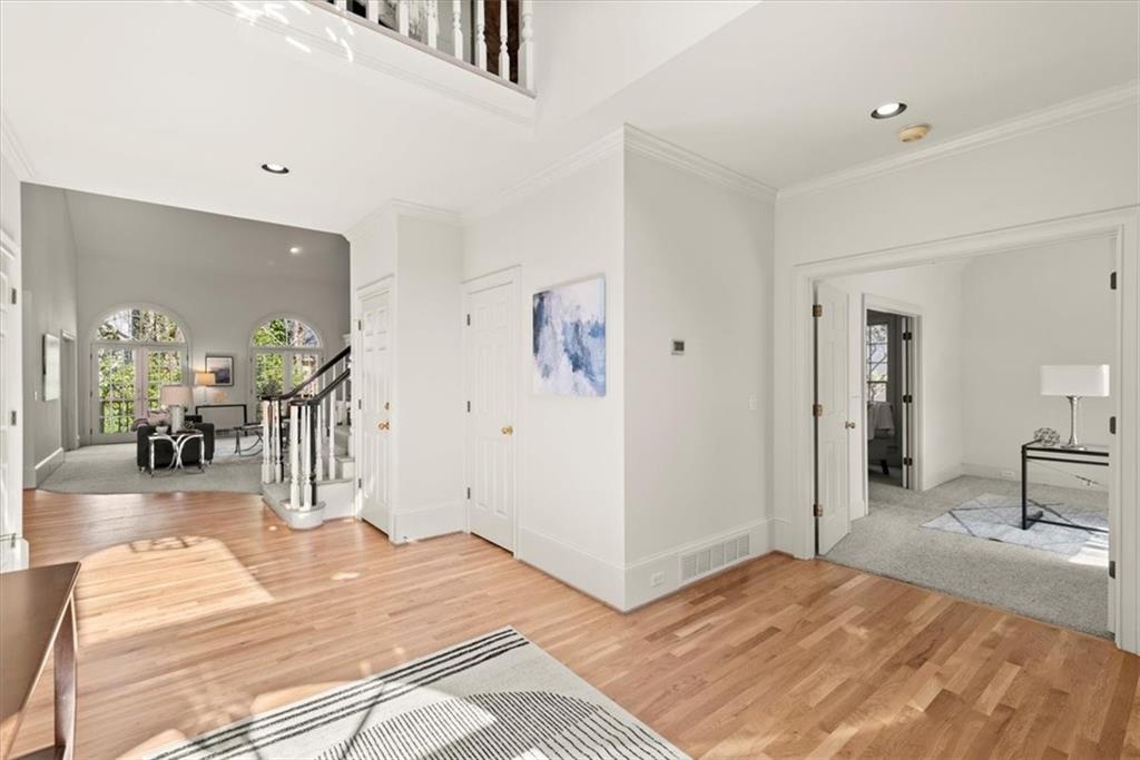 Step into this stunning home and be greeted by an inviting open floor plan that effortlessly flows from the entryway through the family room. Enjoy panoramic views of the lush greenery from the private and tranquil back deck. Step into this stunning home and be greeted by an inviting open floor plan that effortlessly flows from the entryway through the family room. Enjoy panoramic views of the lush greenery from the private and tranquil back deck.