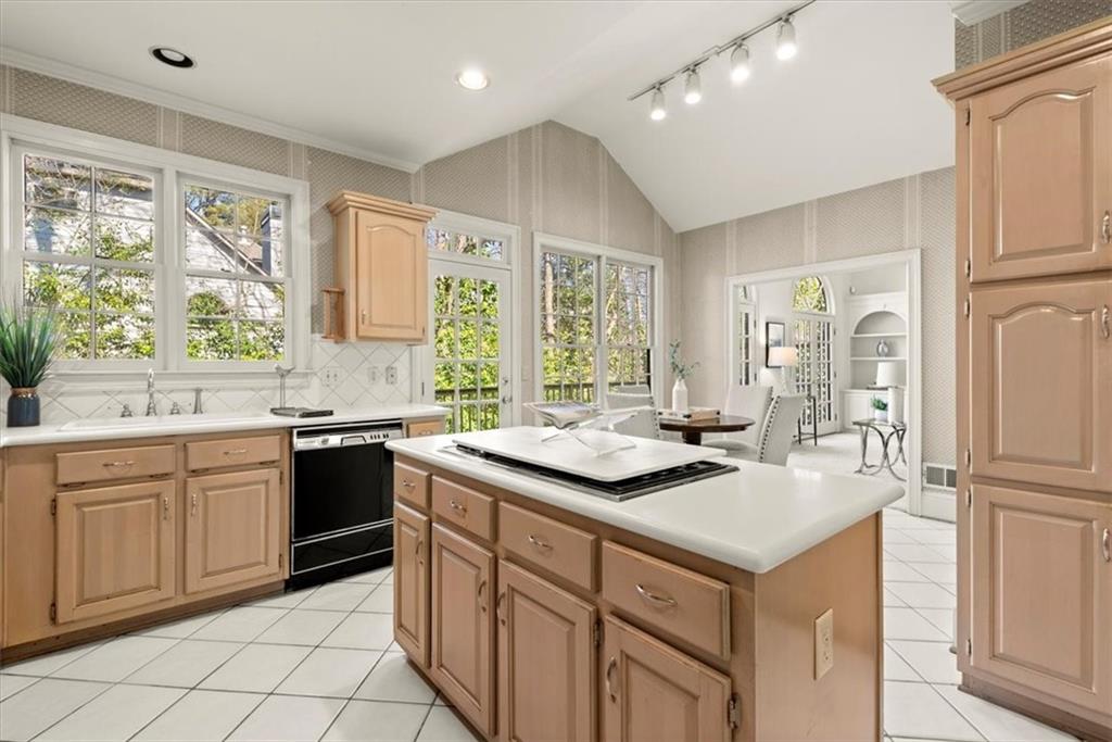 This kitchen boasts abundant storage options and high ceilings. With a well-designed layout and ample room to store essentials, you will love the functionality of the space. This kitchen boasts abundant storage options and high ceilings. With a well-designed layout and ample room to store essentials, you will love the functionality of the space.