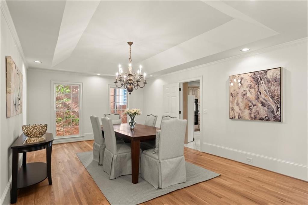 Host memorable gatherings with ease in this spacious, oversized dining room that comfortably accommodates 10+ guests - this room invites cherished moments with family and friends around the table. Host memorable gatherings with ease in this spacious, oversized dining room that comfortably accommodates 10+ guests - this room invites cherished moments with family and friends around the table.