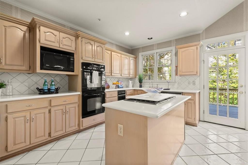 This kitchen features a practical center island that serves as a versatile workspace. With ample storage and countertop space, it's the perfect hub for meal preparation and socializing. A simple yet efficient design that meets your everyday needs. This kitchen features a practical center island that serves as a versatile workspace. With ample storage and countertop space, it's the perfect hub for meal preparation and socializing. A simple yet efficient design that meets your everyday needs.