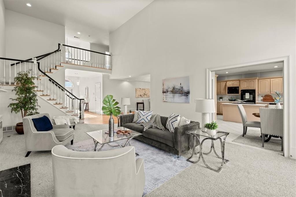 The bridge walkway on the second story offers a unique architectural feature to the space and provides an open and airy feel to the second floor. The bridge walkway on the second story offers a unique architectural feature to the space and provides an open and airy feel to the second floor.