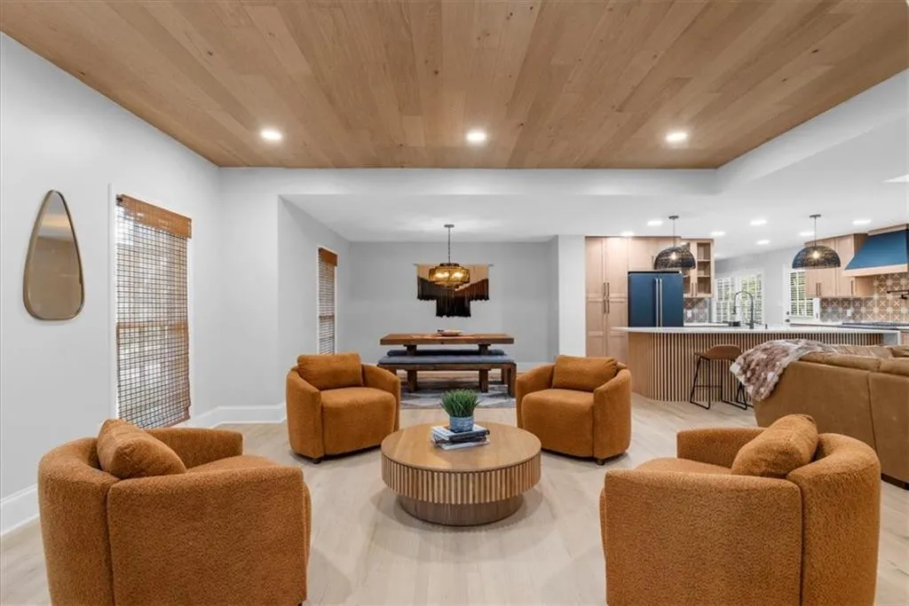 Living room with recessed lighting, wood ceiling, billiards table, and light wood-style flooring