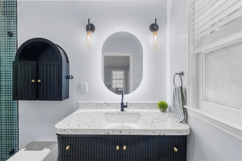 Bathroom featuring vanity and bidet toilet