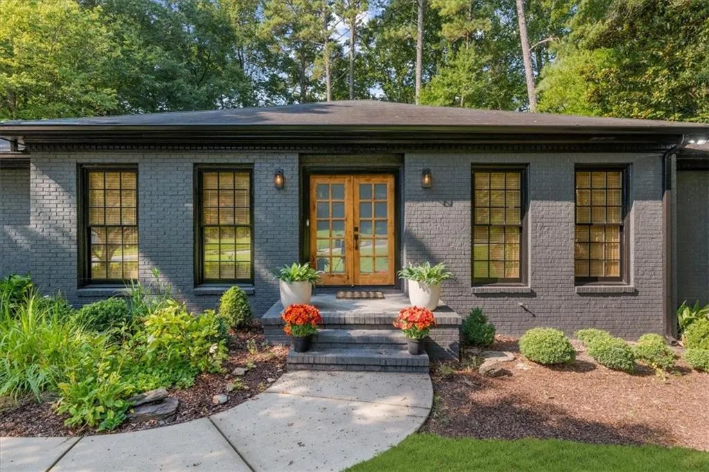 Property entrance with brick siding