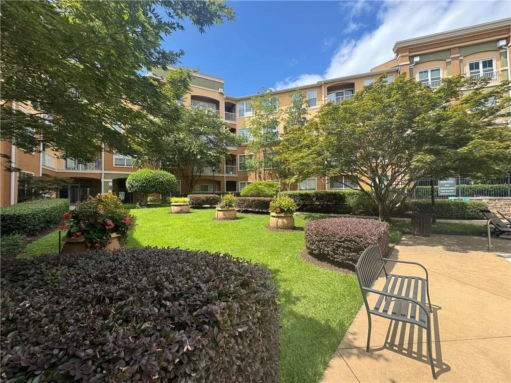 Surrounding community featuring a lawn