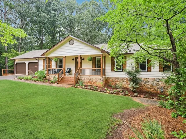 Charming details and fresh paint elevate the exterior appeal.