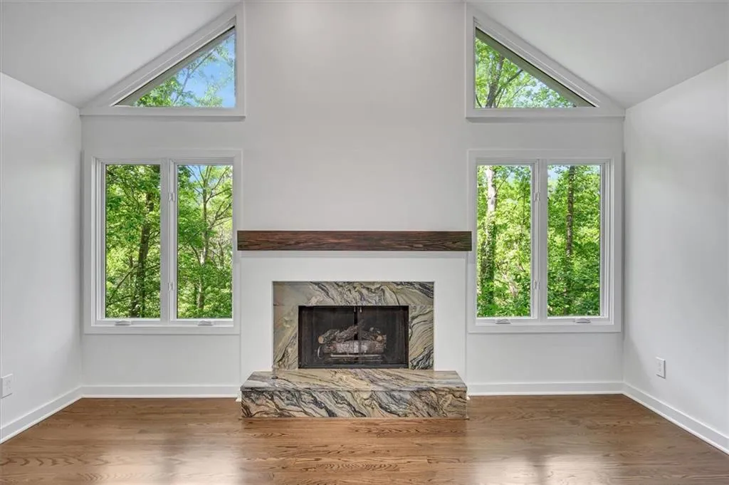 Primary with vaulted ceiling, fireplace and private views