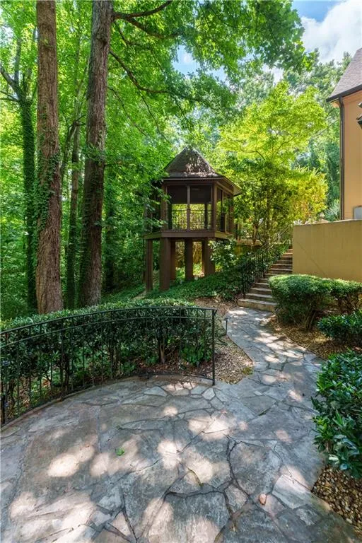 Screened gazebo is like a treehouse!