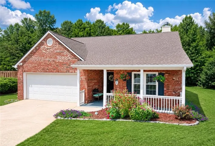 Brick exterior with covered front porch