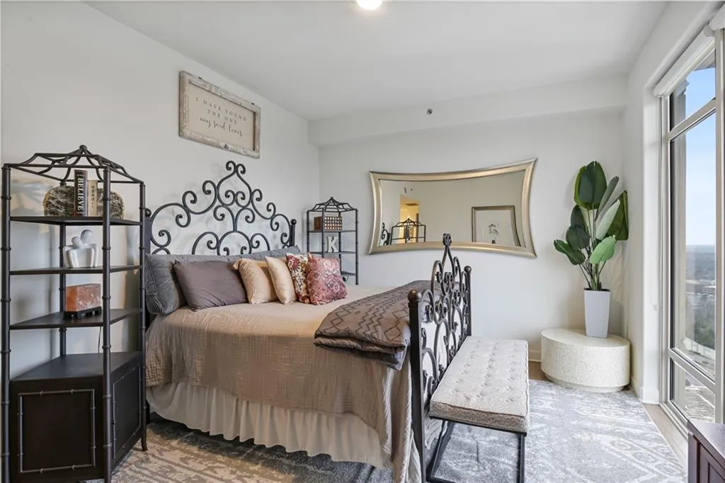 Bedroom featuring multiple windows