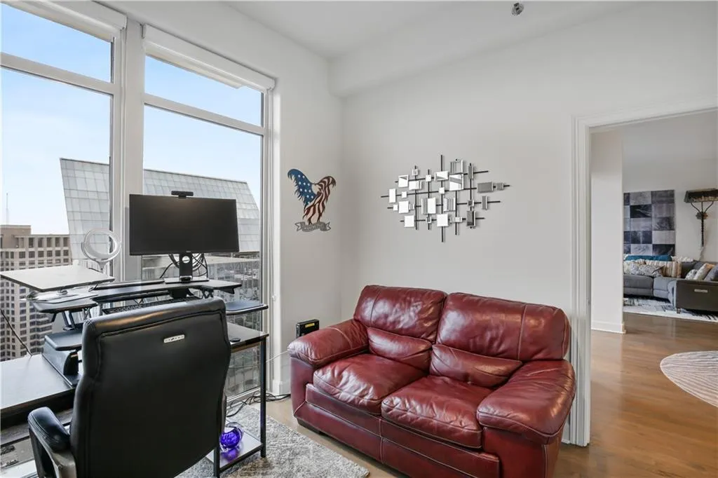 Office featuring hardwood / wood-style floors