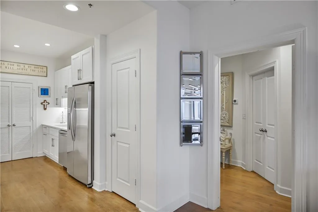Corridor featuring light hardwood / wood-style flooring