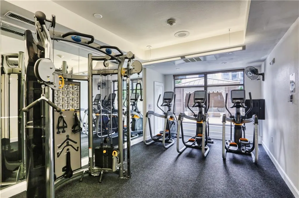 Workout area with a tray ceiling