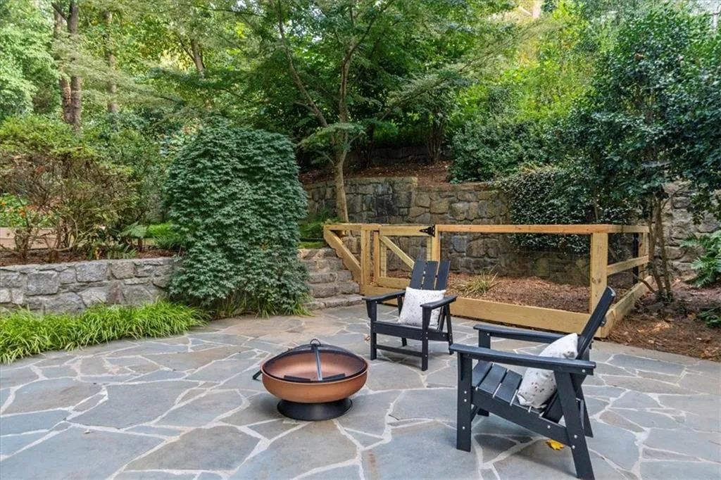 View of patio / terrace featuring an outdoor fire pit