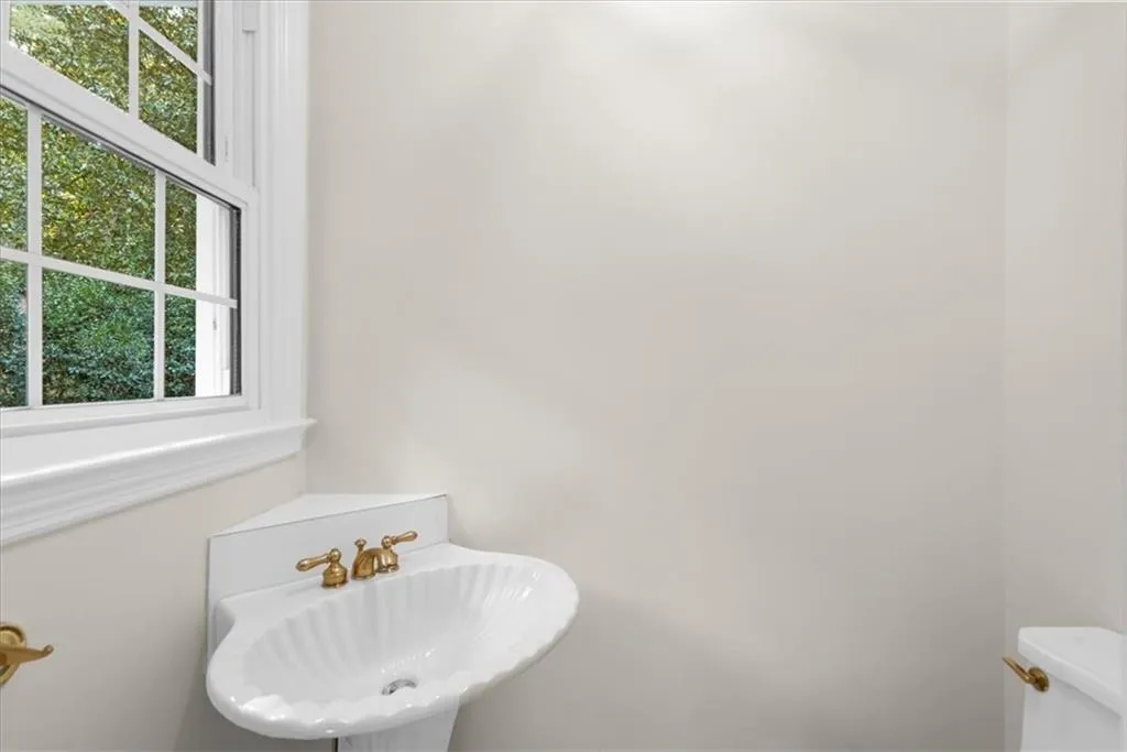 Bathroom with a sink and toilet