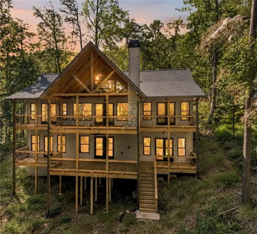 Over 1500 SF of full length upper and lower deck with mountain views, fireplace and hot tub