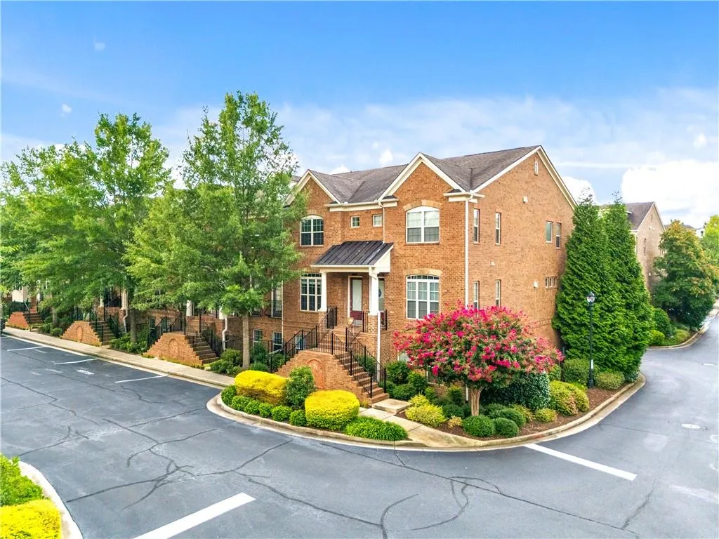 View of front of property with brick siding