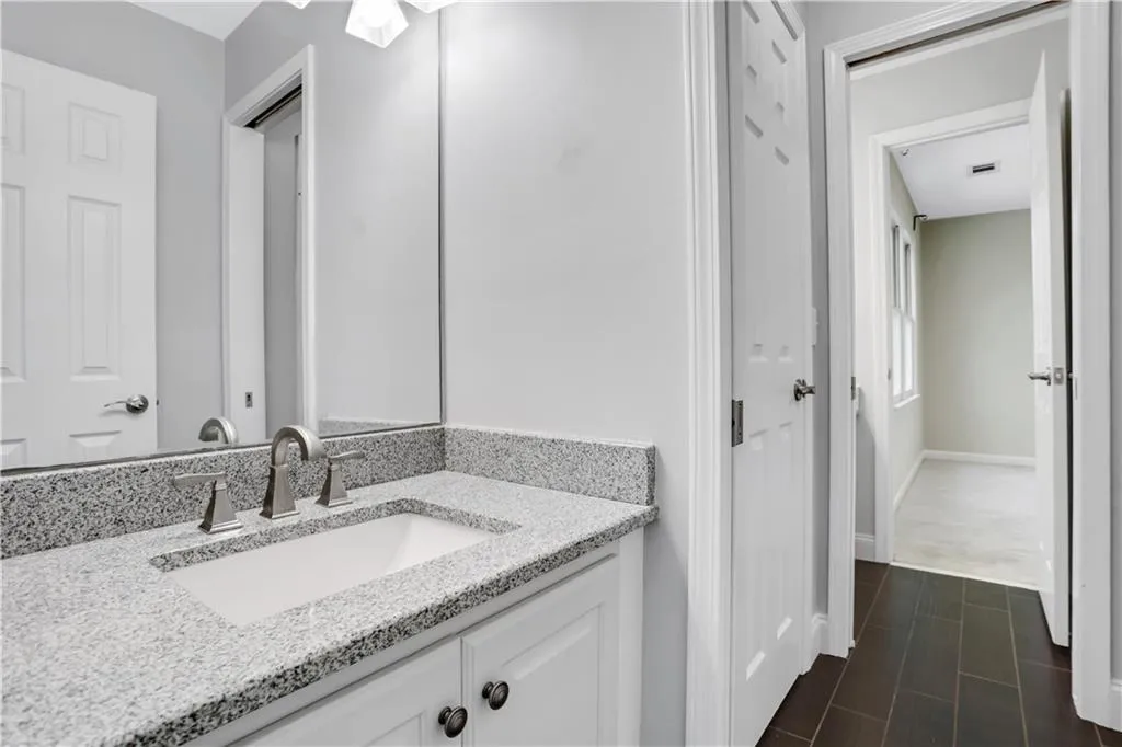 Bathroom with tile flooring and vanity Bathroom with tile flooring and vanity