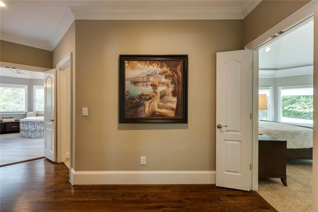 Primary suite with double doors allows for total privacy and separation from other bedrooms.