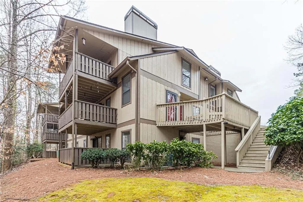 Rear view of house featuring a balcony