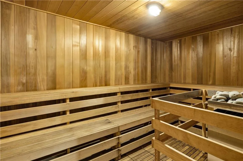 Relaxing sauna with wooden ceiling and wood walls