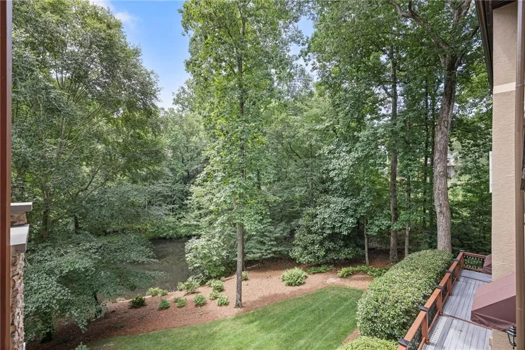 View of backyard and pond
