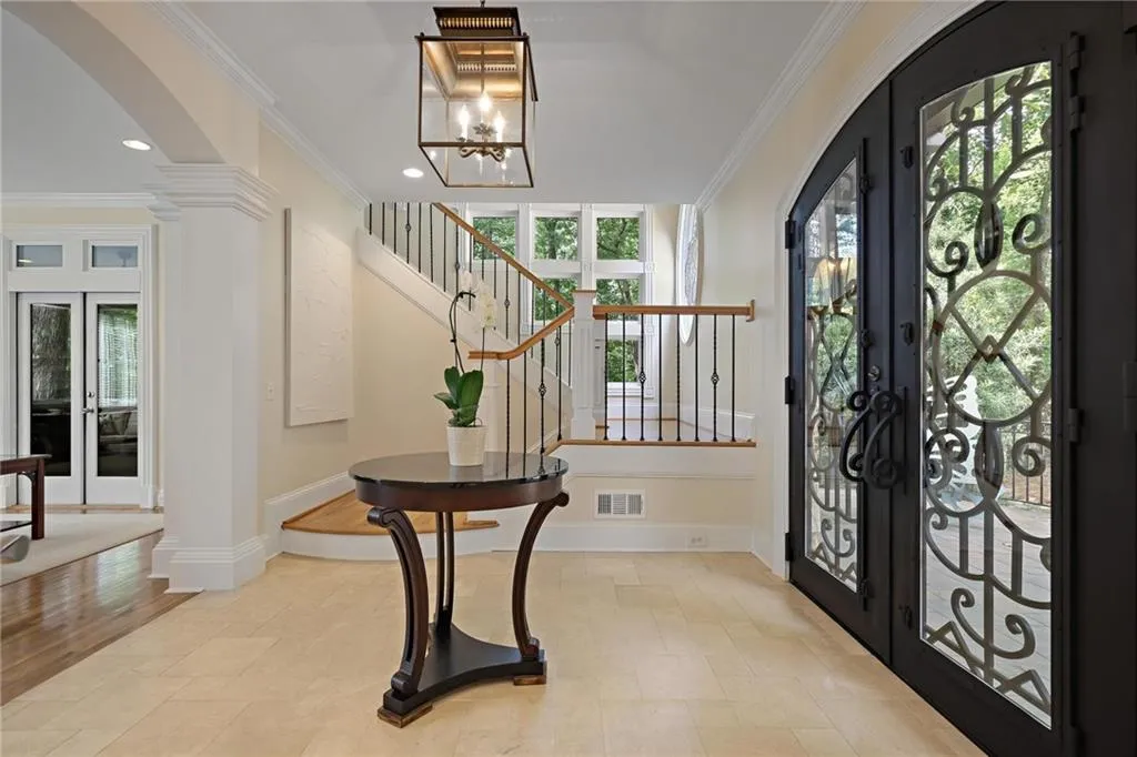 Foyer with stunning iron doors!