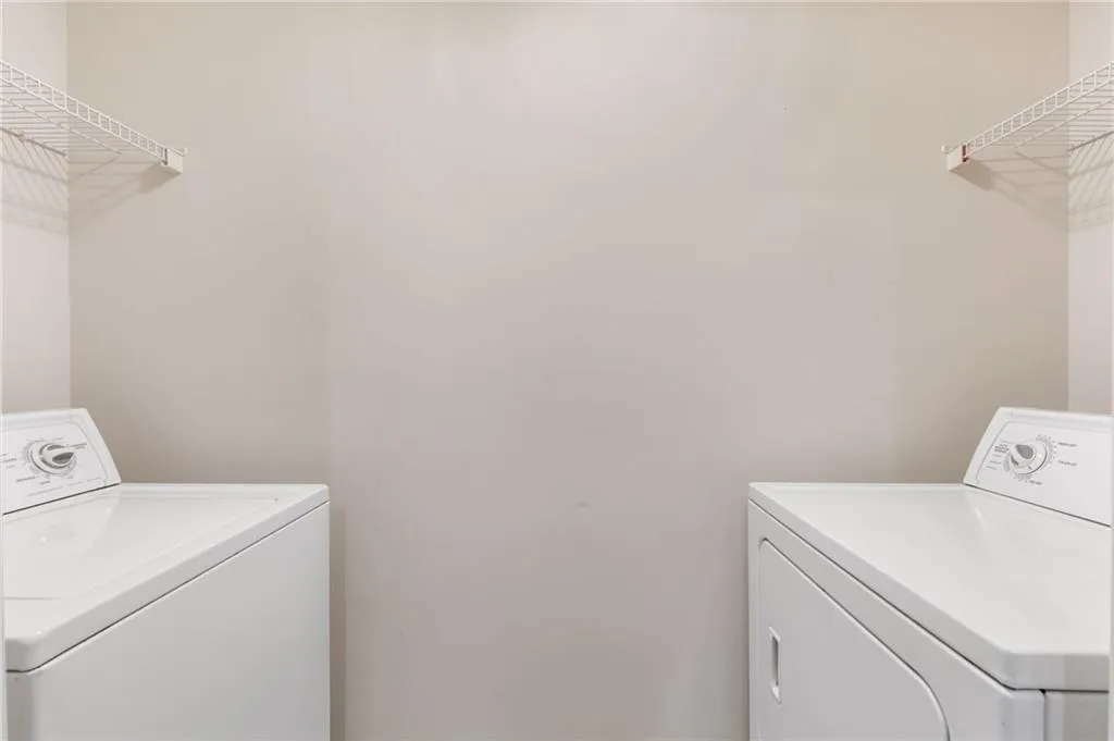 Laundry room featuring washer and dryer
