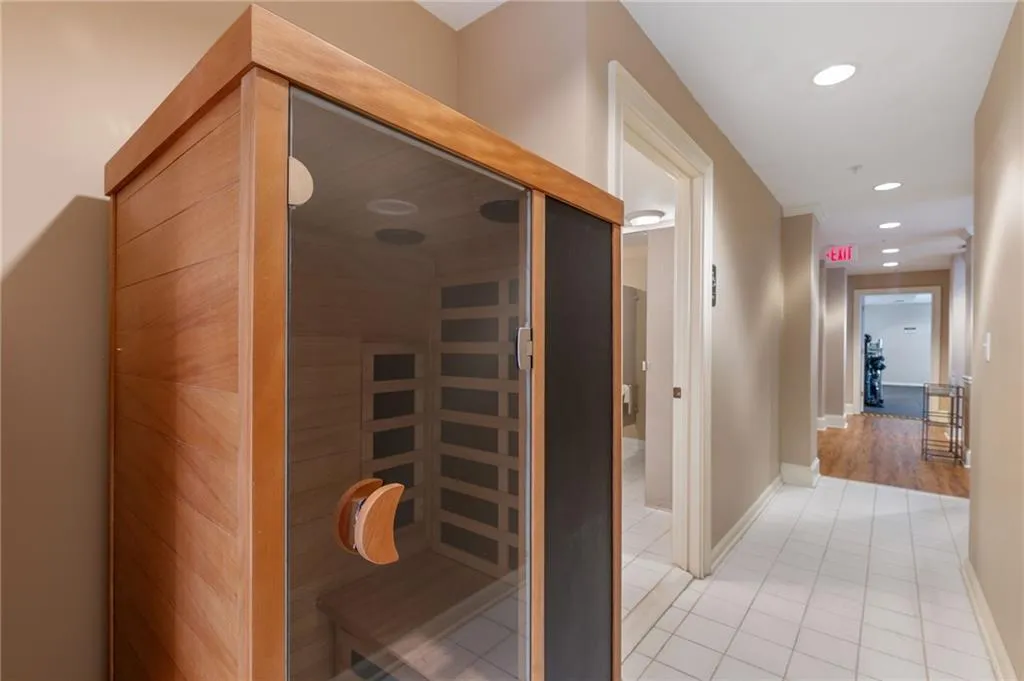 Sauna / steam room featuring recessed lighting and tile patterned flooring