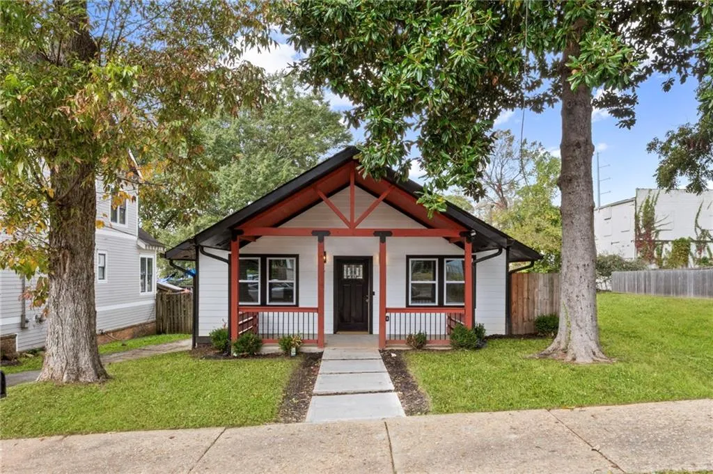 Bungalow featuring covered porch