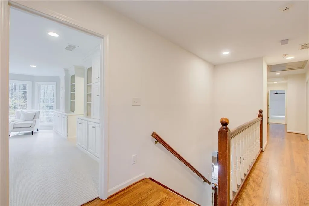 Upstairs landing has hardwood flooring