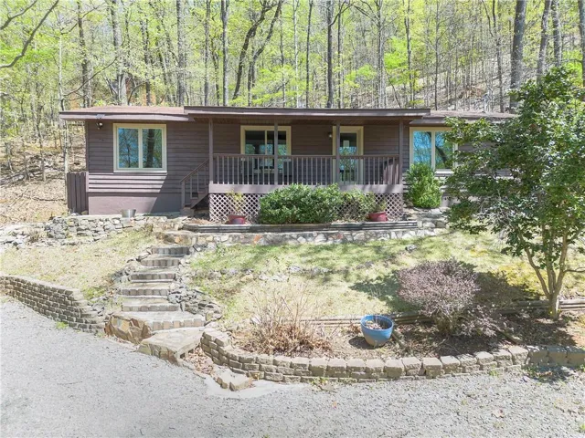147 Laurel Mill Trail sits on .86 acres in a private area of Bent Tree.