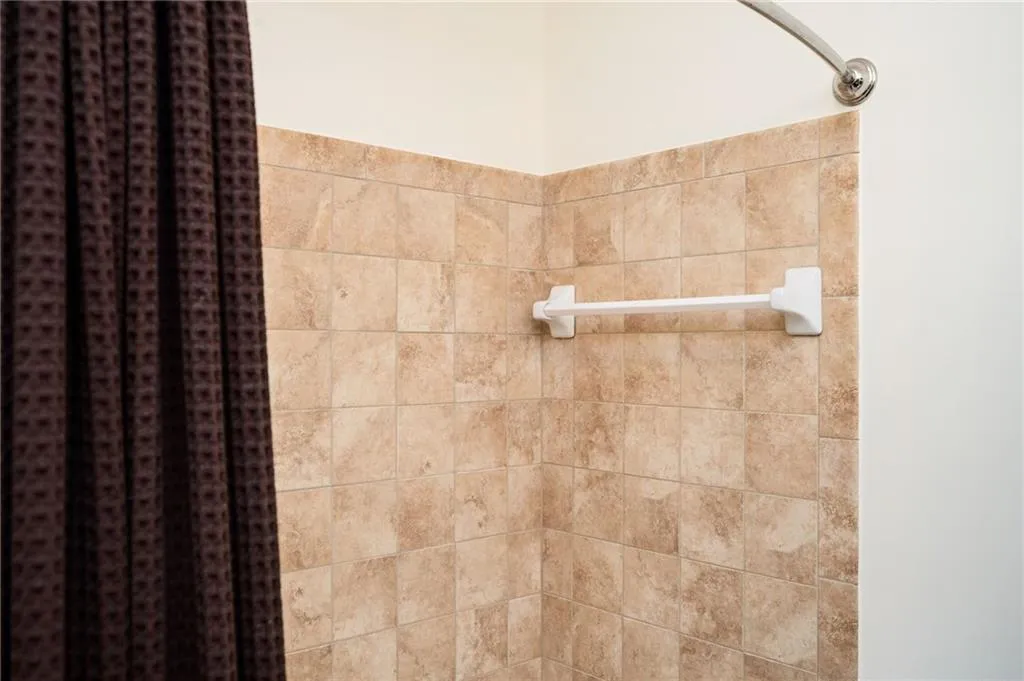Room details with walk in shower