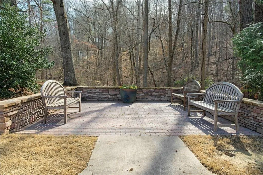 View of patio featuring a view of trees