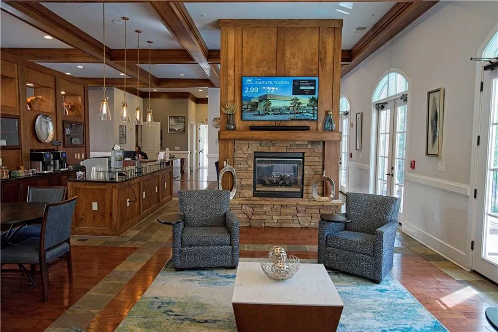 recessed lighting, a fireplace, and coffered ceiling