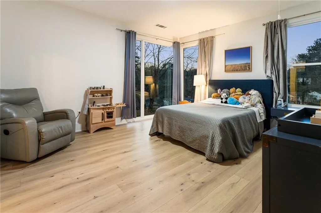 Bedroom with light wood-style flooring